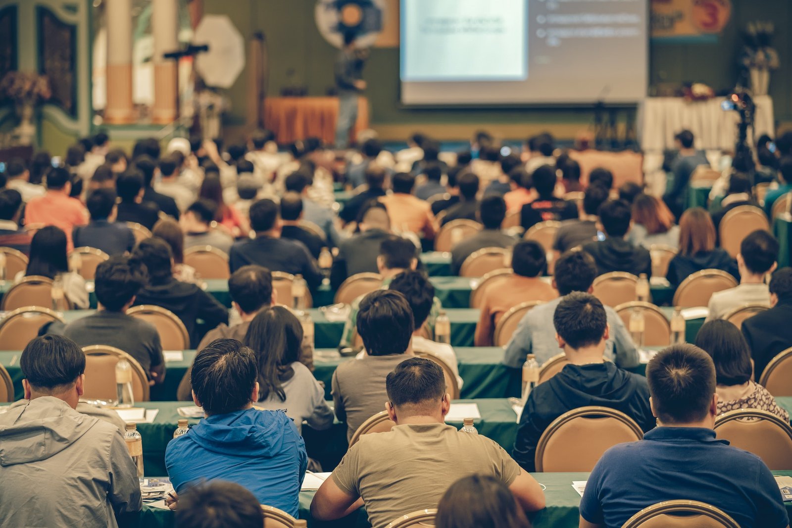 rear-view-of-audience-in-the-conference-hall-or-seminar-meeting-which-have-speakers.jpg